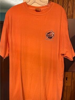 Comfort Colors Unisex Short-Sleeve Tee in Bright Orange with Small Chest Graphic